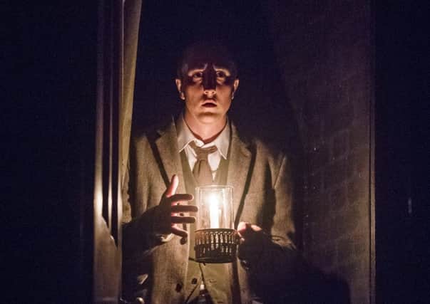 A scene from The Woman In Black. Picture by Tristram Kenton