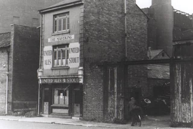 The United Ales pub The Mafeking in Warblington Street, Old Portsmouth.  The power station chimney can be seen on the right.