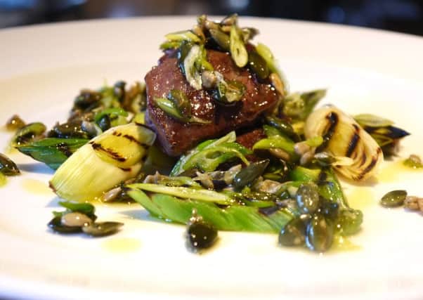 Pigeon with leeks and a seed and honey dressing