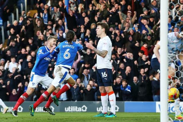 Christian Burgess celebrates his goal in Pompey's win against Luton in January. Picture: Joe Pepler