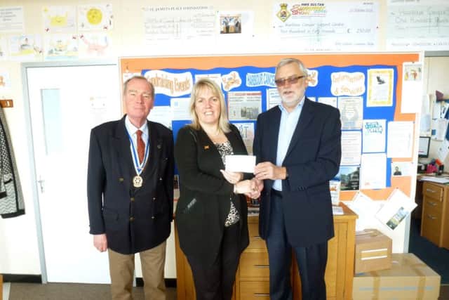 From left, Graham Collins, Melanie Whitfield-Tinker and Ken Eckersley