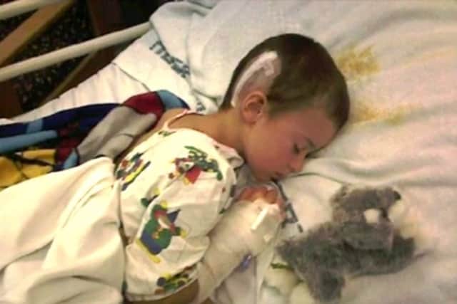 Lewis included pictures in the video showing him in hospital as a child. Photo: Lewis Hine
