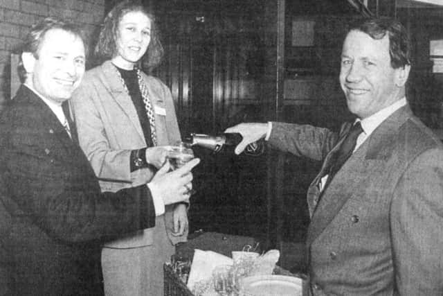 Trying the champagne were new residents Clive Norris, a print buyer for NM Financial management, banking secretary Sarah Gillespie, and Peter Crowther, managing director of Acorn Business Centres Ltd (B6388-1)