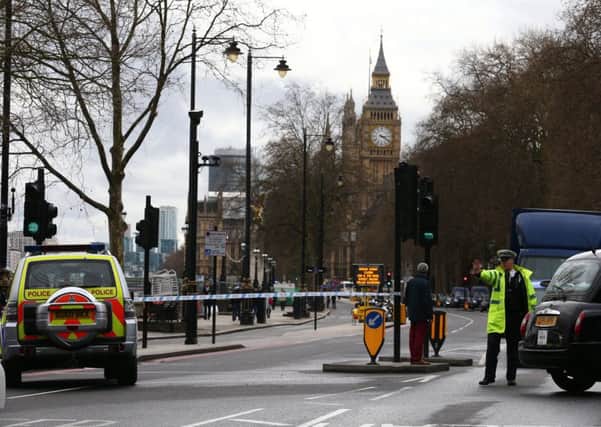 The scene outside the Houses of Parliament where an incident is unfolding, Photo: SWNS
