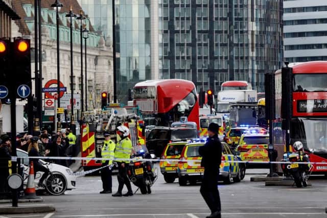 Police close to the Palace of Westminster, London, after sounds similar to gunfire have been heard close to the Palace of Westminster. Photo credit: Victoria Jones/PA Wire