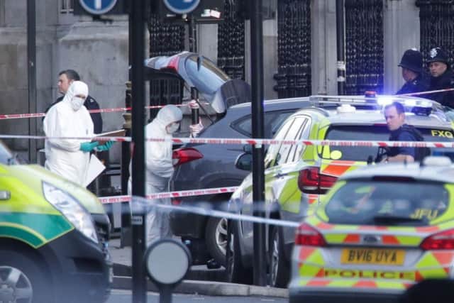 Police forensic officers close to the Palace of Westminster  Picture: Yui Mok/PA Wire