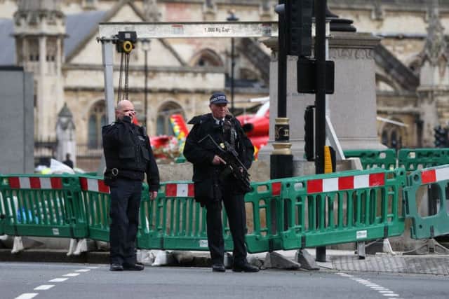 Police close to the Palace of Westminster. Photo: Jonathan Brady/PA Wire