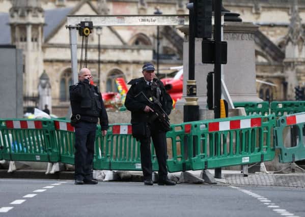 Police close to the Palace of Westminster. Photo: Jonathan Brady/PA Wire