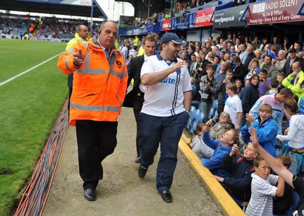 Sulaiman Al Fahim goes walkabout around Fratton Park in 2009 as he meets the Pompey fans