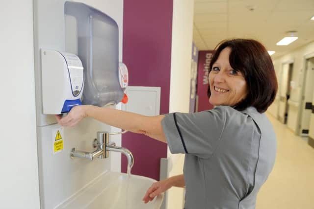 Sally Bound, support worker at Queen Alexandra Hospital shows how it's done.
Picture: Sarah Standing (170279-3484)