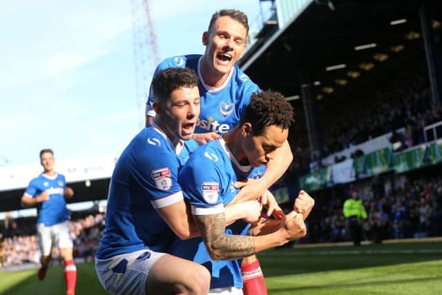 Conor Chaplin and Kal Naismith celebrate with Kyle Bennett following his opener Picture: Joe Pepler