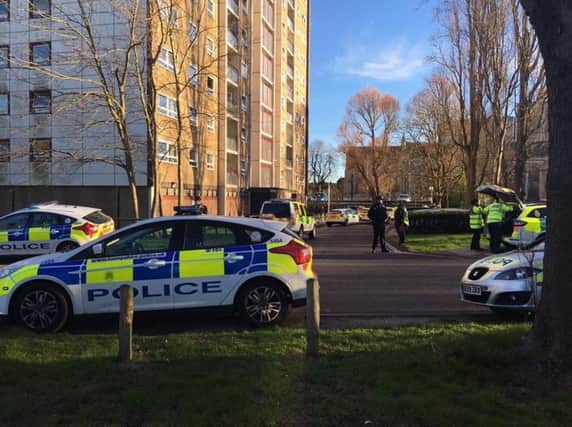 Police at the scene of Nickelby House, Buckland where a man has fallen to his death. PPP-170325-172228001