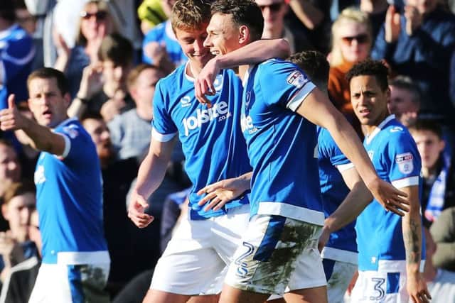 Tom Davies congratulates Kal Naismith following his goal Picture: Joe Pepler