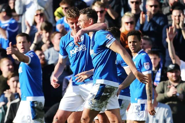 Tom Davies congratulates Kal Naismith following his goal Picture: Joe Pepler