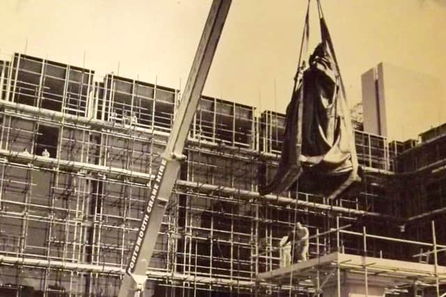 Queen Victoria being settled on to her new throne in Guildhall Square, Portsmouth, in 1972.