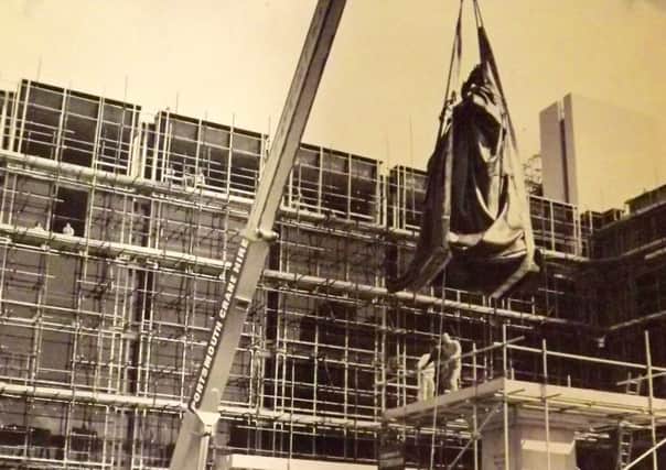 Queen Victoria being settled on to her new throne in Guildhall Square, Portsmouth, in 1972.