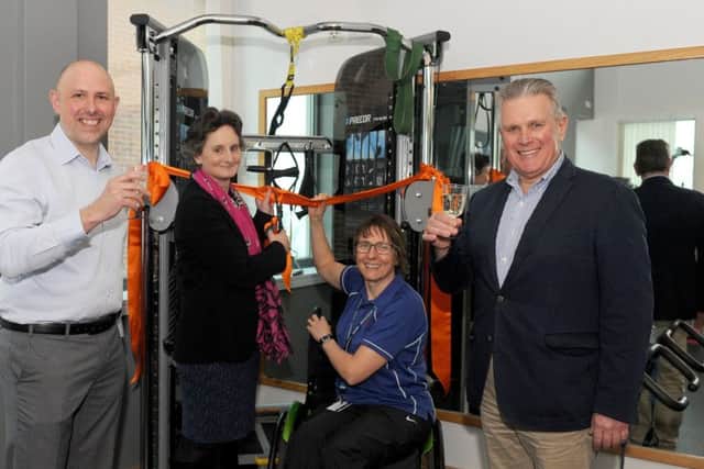 From left, Matt Mason, centre director, Flick Drummond, MP for Portsmouth South, Jude Caunter, fitness instructor and Peter Goodship, chairman of the John Pounds Centre board.  Picture: Sarah Standing (170381-3840)