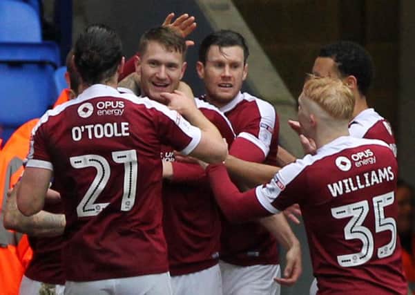 Northampton's Michael Smith celebrating his goal against Bolton. Picture: Sharon Lucey