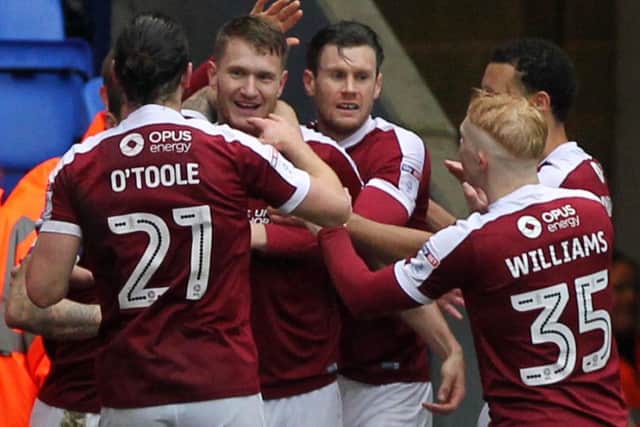 Northampton's Michael Smith celebrating his goal against Bolton. Picture: Sharon Lucey
