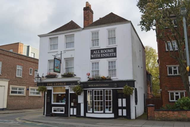 The George Hotel, Queen Street, Portsea: the tiling below the left hand ground floor window has the inscription Jewell & Sons Ale, a unique survivor of this former Portsmouth brewery.
Pictures: Steve Wallis/Amberley