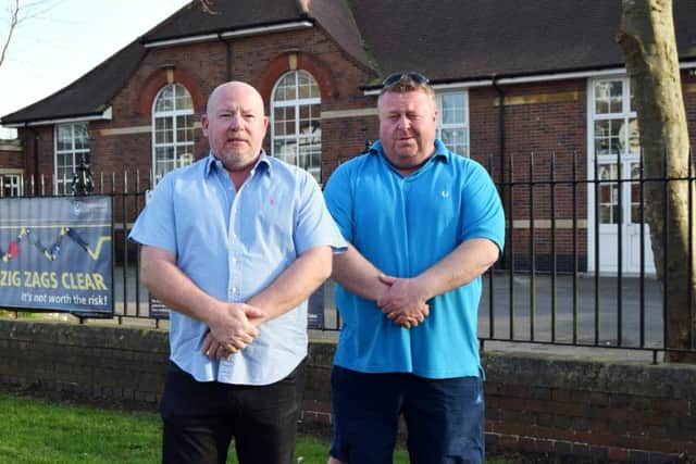 Disgruntled residents Steve Hobbs, left, with Colin Major, right, outside Northern Parade schools, in Hilsea.