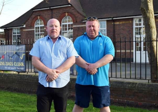 Disgruntled residents Steve Hobbs, left, with Colin Major, right, outside Northern Parade schools, in Hilsea.