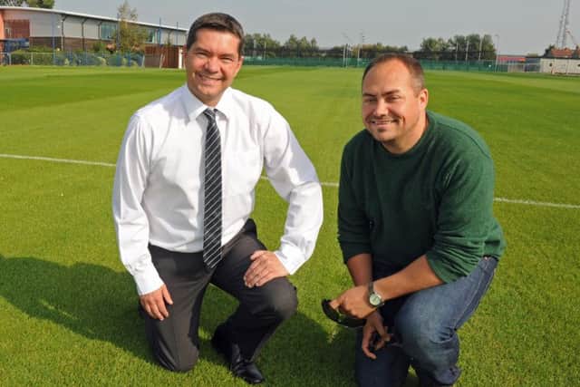 Mike Saunders, right, with Pompey chief executive Mark Catlin