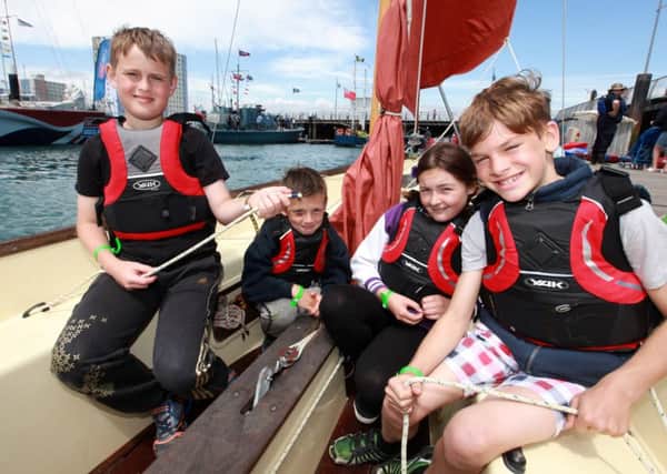 Sailors 
Ethan Roberts-Watts. 10, James Mulroy, eight, Abigail Mulroy, 12, and Rowan Clelland-Pryke, nine, prepare to sail out of Haslar Marina with an instructor during their sailing session this morning at Gosport Marine Festival in 2015. Picture: Matt Scott-Joynt