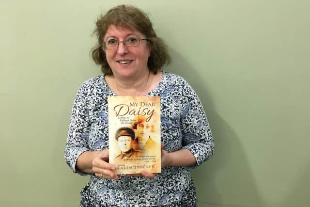 Karen Stocker with her book called My Dear Daisy