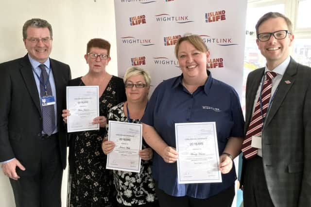 Wightlink Business Development Director Clive Tilley, Trade Sales Coordinator Maria Johnson (30 years), Resource Planning Officer Jo Wells (20 years), Customer Relations Officer Wendy Hamm (20 years), Operations Director Elwyn Dop