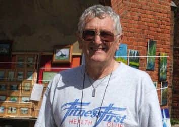 Roy Smith displaying his artwork at the Arches, Old Portsmouth Picture: Jean Smith