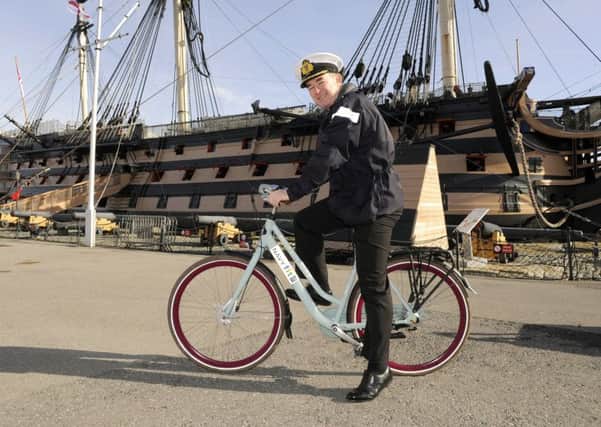 Commodore Jeremy Rigby on one of the new 'Boris bikes' at Portsmouth Naval Base 

Picture:  Malcolm Wells (170313-7879)