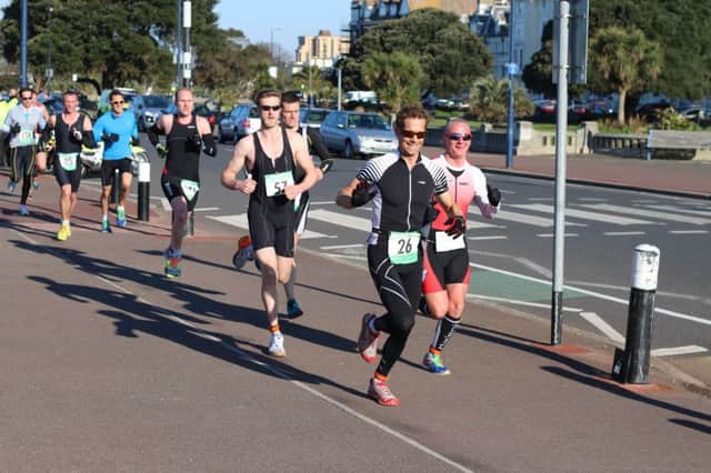 Neil Collins, second right, and Piotr Meller, right, had a flying start to the duathlon series