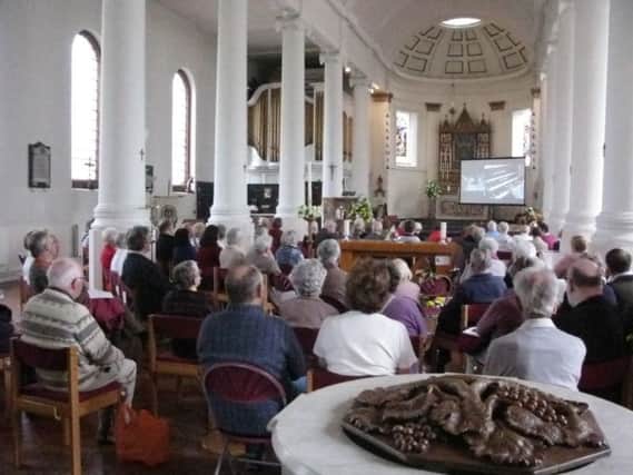 The congregation at Holy Trinity Church, Gosport