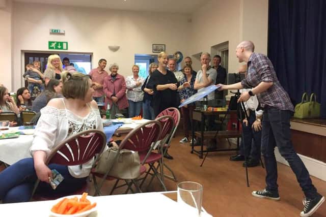 Rev Hayley Young receiving some leaving gifts
