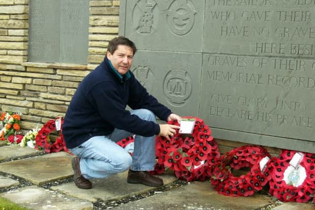 Derek "Smokey" Cole laying a wreath at a cemetary on the Falkland Islands. Picture: Derek Cole