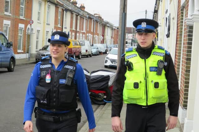 PCSOs in Percy Road after they shut an alleyway between Fawcett Road and Talbot Road