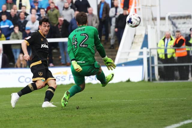 Gary Roberts scores Pompey's second against Hartlepool. Picture: Joe Pepler/