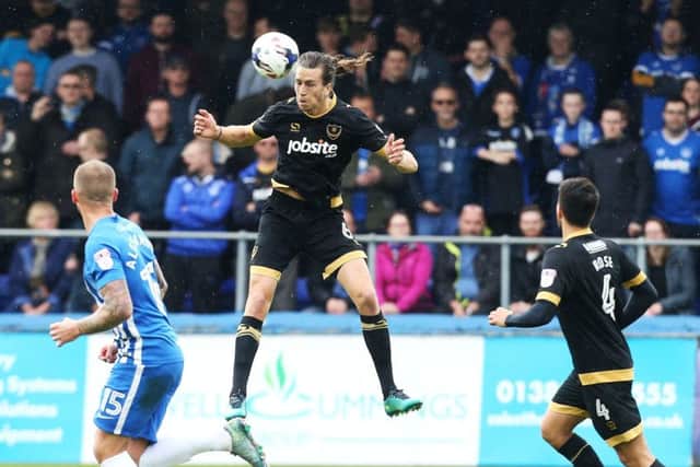 Christian Burgess wins a header for Pompey in the 2-0 win at Hartlepool on Saturday. Picture: Joe Pepler