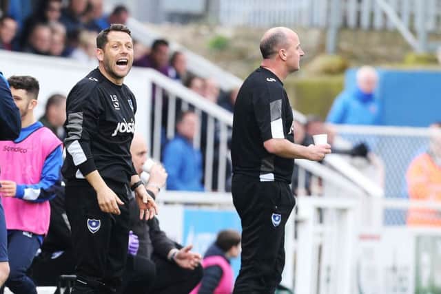 Pompey assistant boss Leam Richardson with manager Paul Cook. Picture: Joe Pepler