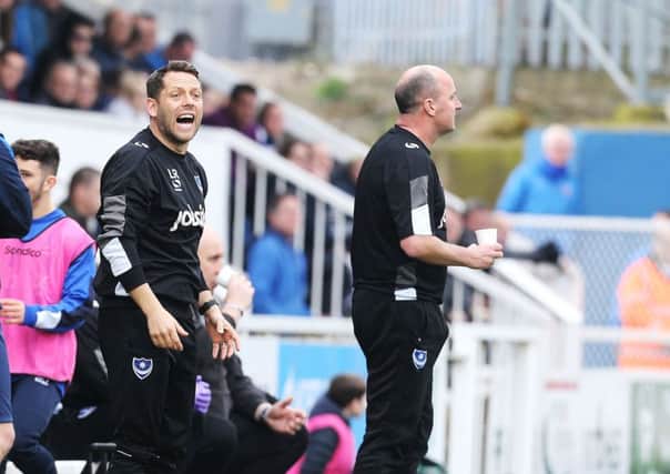Pompey assistant boss Leam Richardson with manager Paul Cook. Picture: Joe Pepler