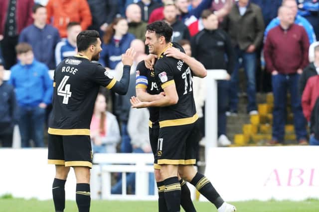 Gary Roberts scoring against Hartlepool. Photo by Joe Peple