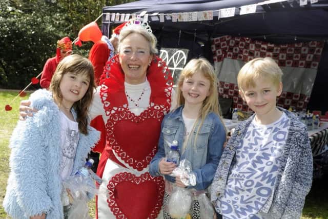 (L-r) Louise Little (seven), Nina Coxwell of Fareham In Bloom,  Izzy Parker (eight) and Sam Parker (eight).  Picture: Ian Hargreaves  (170342-1)