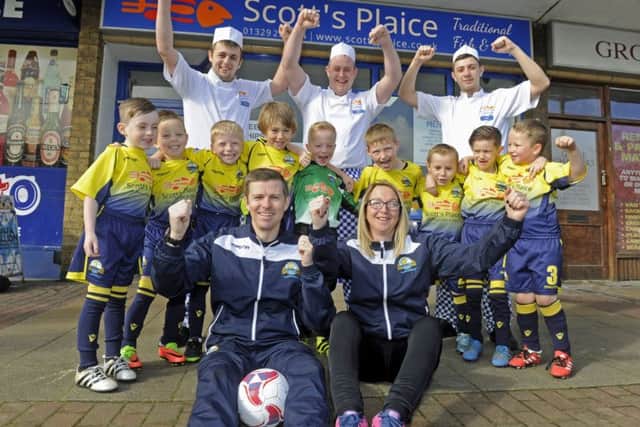 A new under 7's youth football team has been sponsored by Scotts Plaice fish and chip shop in Gosport. (left to right back), Steve King, Scott Turner, Josh Noyce. The team (left to right), Preston Griffiths, Harvey Thompson, Michael Wallin, George Sterling, Reggie Batten, Mason Mancell, Tommy Cole, Frankie White, Tyler Barrett. with front, the coaches John Walin and Carla Gillard.  Photo Ian Hargreaves  (170341-1) PPP-170204-114327006