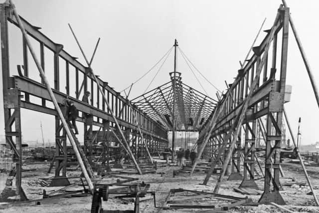 The interior of the New Lock Shipwrights Shop while under construction in 1915.