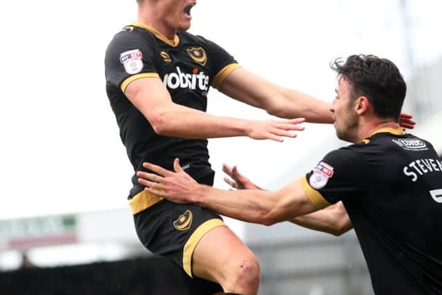 Kal Naismith celebrates scoring at Hartlepool with provider Enda Stevens. Picture: Joe Pepler