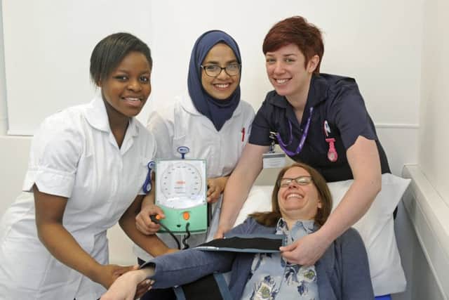 From left, students Blessing Taiwo and Yasira Ghaseeta and instructor Gilly Mancz with patient Lucy Bailey Picture: Ian Hargreaves (170336-1)