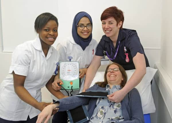 From left, students Blessing Taiwo and Yasira Ghaseeta and instructor Gilly Mancz with patient Lucy Bailey Picture: Ian Hargreaves (170336-1)
