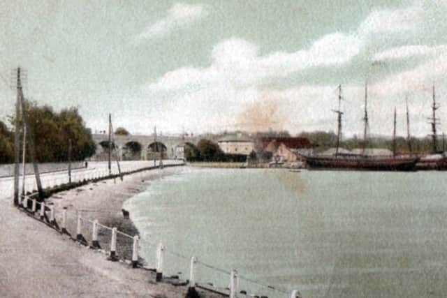 Looking north towards Fareham town with the Gosport Road to the left, we see two sailing vessels tied up in Fareham Creek.