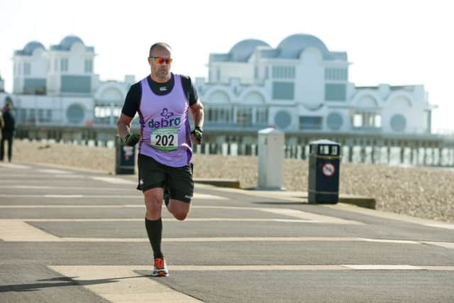 RUNNING Dave Rodrigues during a marathon. Picture Ian Burnett